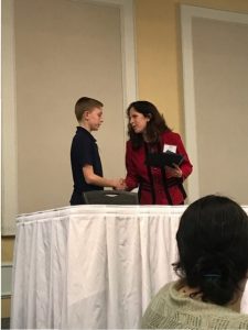 Child receiving award